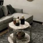 Restored vintage coffee table in a modern living room, blending history and sustainability.